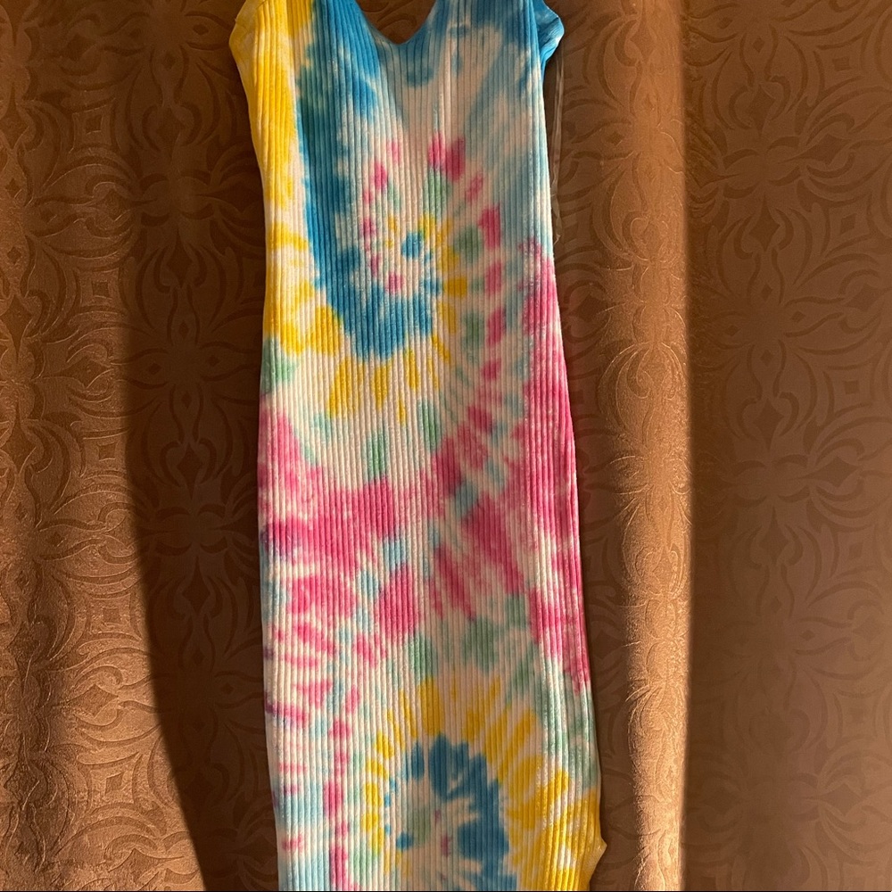 Super cute tie dye stretchy knee length dress with a side slit. Never worn!